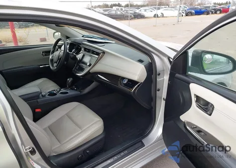 2014 Toyota Avalon Hybrid Limited from USA, damaged, VIN 4T1BD1EBXEU023570